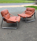 Paire de fauteuils annees 60